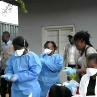 Congo curtails funeral wakes in Ebola outbreak as WHO upgrades risk assessment