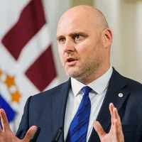 Latvian centrist moves to form coalition government