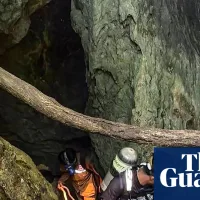 ‘Essentially diving in coffee’: Australian diver among team rushing to rescue people trapped in flooded Laos cave