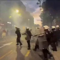 Protesters clash with police after an anti-government rally in Serbia's capital